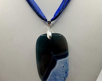 Black and Blue Agate Pendant Necklace on Blue Organza