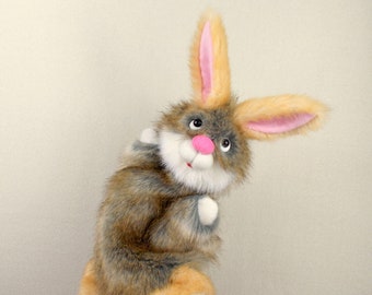 Rabbit plush puppet. Hare reddish gray hand puppet for home theater. Puppet glove bunny. Bibabo. Marionette. Rabbit stuff toy glove. Bibabo.
