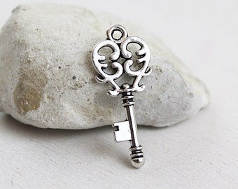 10 pièces - pendentif clé - argent