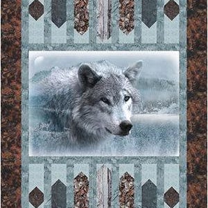 May include: A gray wolf with a white chest and a black nose is looking to the right. The wolf is in a snowy landscape with a blue sky and white clouds. The image is framed with a brown and blue geometric pattern.
