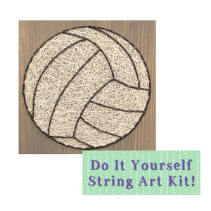 May include: Do It Yourself String Art Kit! A string art kit featuring a white volleyball on a brown wooden background.