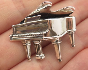 piano brooch
