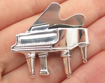 piano brooch