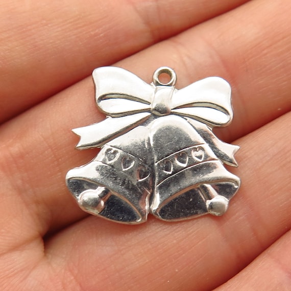 0.79 in x 0.59 in Jewel Tie Sterling Silver Polished Movable Bell Charm 0.79 in x 0.59 in Jewel Tie Sterling Silver Polished Movable Bell Charm