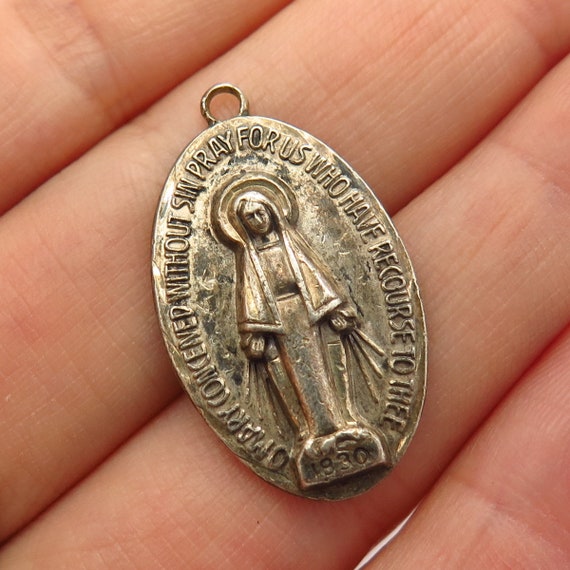 Vintage sterling silver religious best sale medals