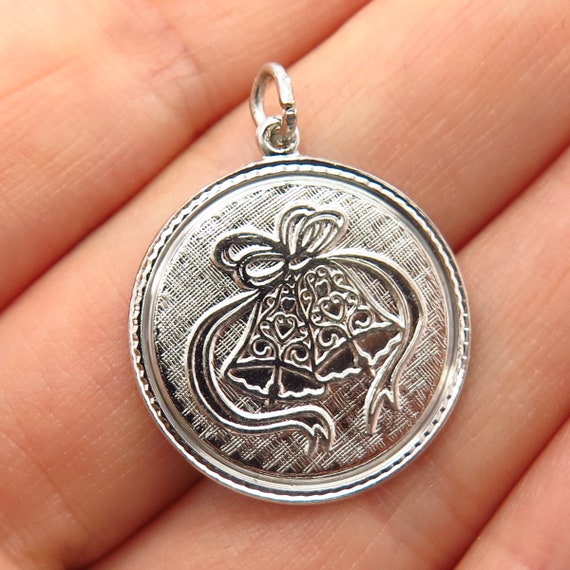 0.79 in x 0.59 in Jewel Tie Sterling Silver Polished Movable Bell Charm 0.79 in x 0.59 in Jewel Tie Sterling Silver Polished Movable Bell Charm