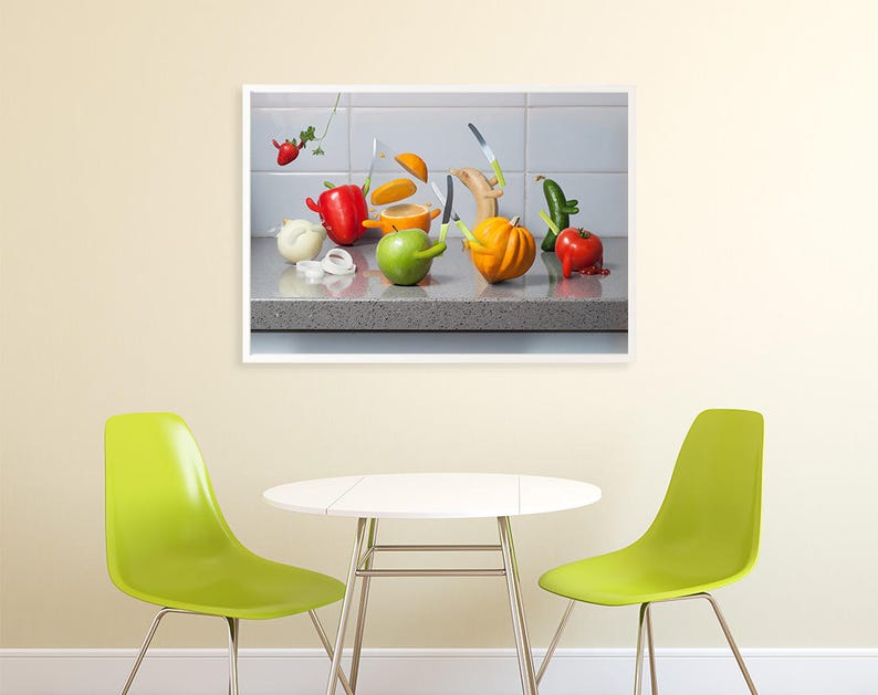 May include: A still life photograph of a variety of fruits and vegetables arranged on a countertop. The fruits and vegetables are arranged in a way that suggests they are being cut or sliced. The image is in a white frame.