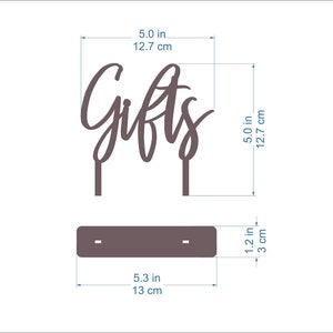 May include: Brown acrylic cake topper with the word "Gifts" in a cursive font. The topper is 5 inches tall and 5 inches wide.