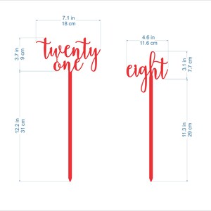 May include: Two red acrylic cake toppers with the words "twenty one" and "eight" in a cursive font. The toppers are 12.2 inches and 11.3 inches tall, respectively.