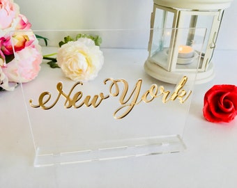 Table City Signs Numéro de table de mariage Numéro de table personnalisé Noms personnalisés Décorations Pièce maîtresse de la réception Panneau en acrylique transparent avec base