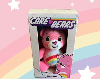 Colección Care Bears Care Bears Micro osito de peluche Mini osito de peluche de 3" Cheer Bear