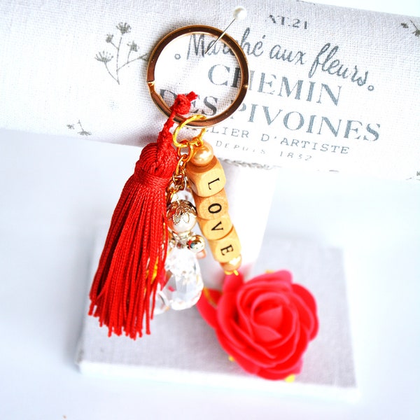 Key ring or bag jewelry, red, LOVE wooden beads, and little angel.