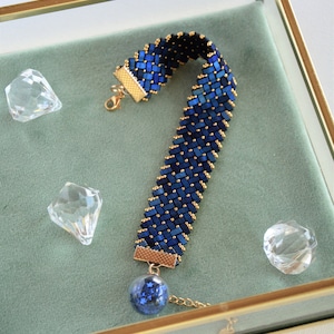 Dark blue, moiré Half Tila bead bracelet.