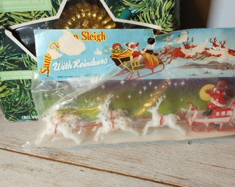 Mid Century Santa Sleigh Reindeer plastic Hong Kong table top decor