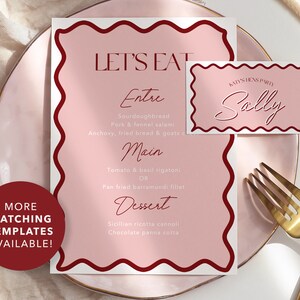 May include: A pink and red menu card with a wavy border and the text "Let's Eat" at the top. The menu lists "Entre", "Main", and "Dessert" options. A smaller pink and red card with a wavy border says "Sally's Hens Party" and "Sally" in cursive.