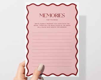 May include: A pink card with a red border and the text "MEMORIES FOR THE BRIDE" at the top. The card has lines for writing down memories with the bride.