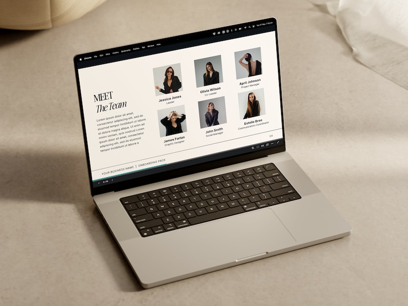 May include: A laptop screen displaying a website with a team of people. The website has a black and white design with the text "MEET The Team" at the top. The website also includes photos of the team members and their names and job titles.