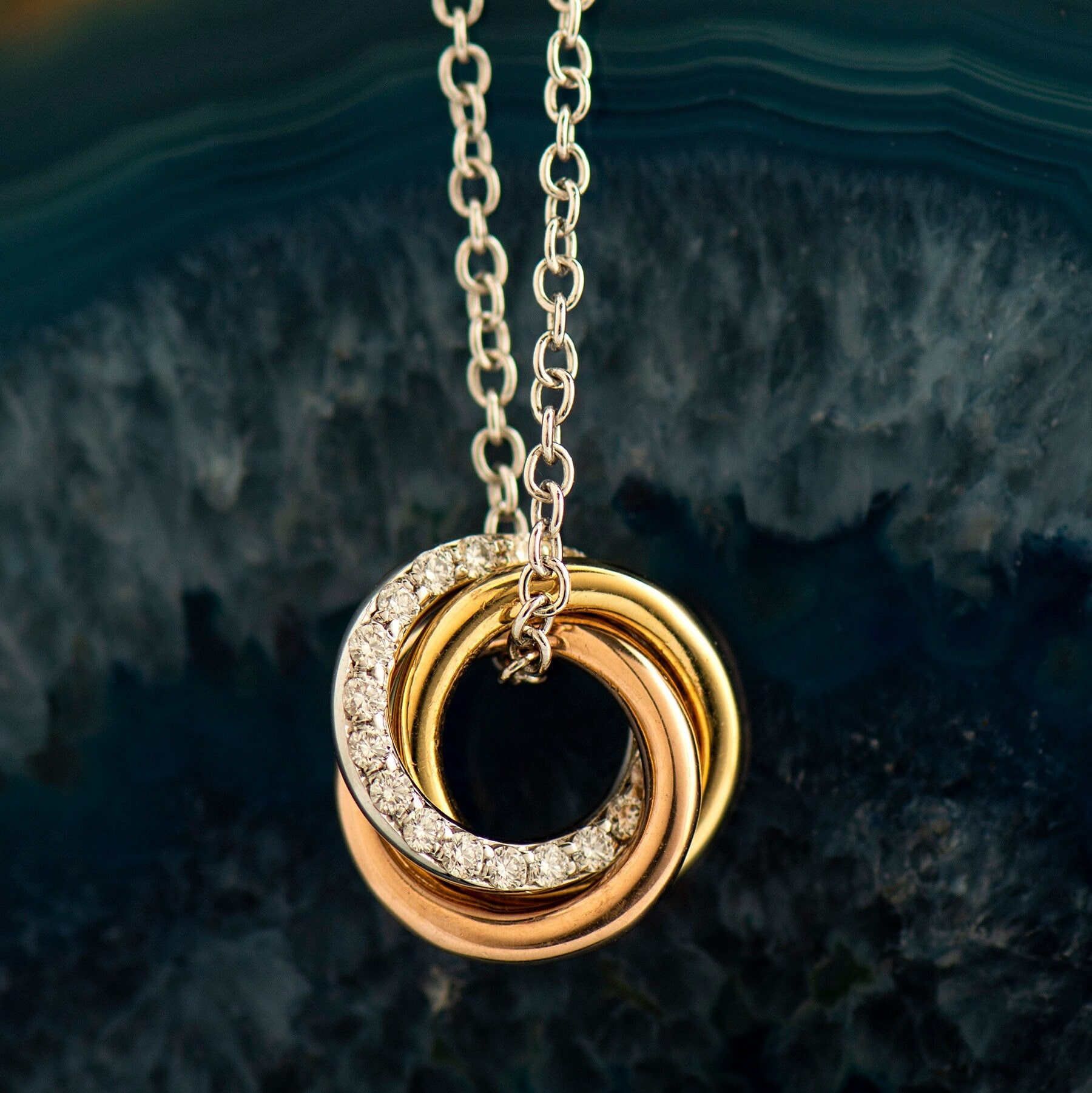 Cartier Rose Gold and Diamond Interlocking LOVE Necklace | Harrods IE