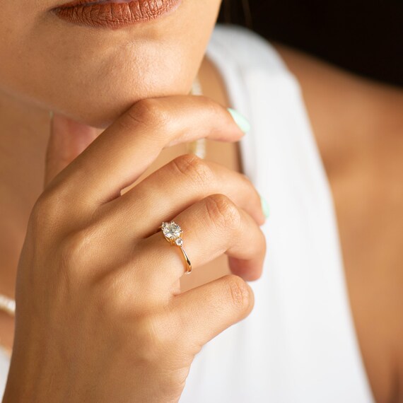 Dainty three stone engagement best sale ring