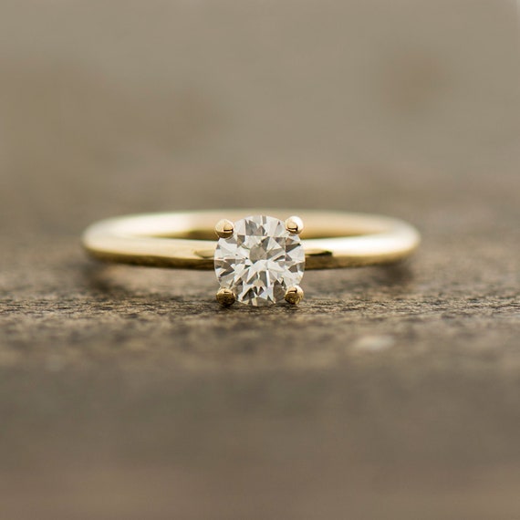 Simple engagement hotsell rings yellow gold