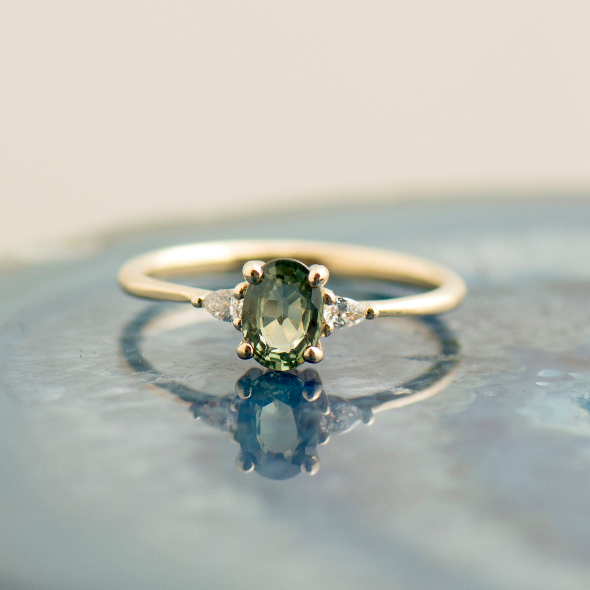 Green sapphire deals eternity ring