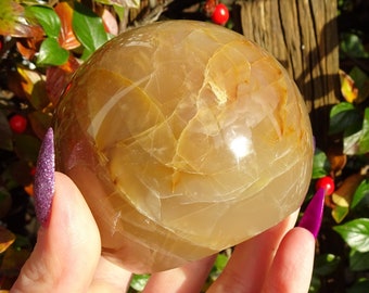 Polished Flashy Peach Moonstone Sphere - 590g - 8cm Diameter - Self Standing