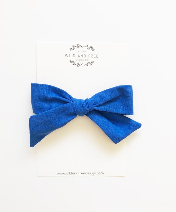 Royal blue hand tied bow nylon headband or clip