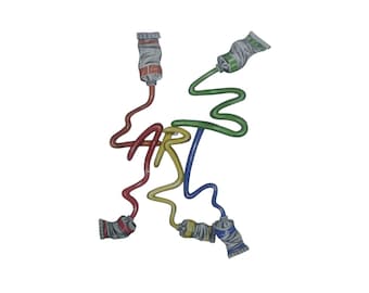 May include: A colorful illustration of the word "ART" formed by squeezed out paint tubes. The tubes are red, yellow, blue, and green.