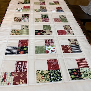 Quilted Christmas Table Runner, Tan, Red, Black, Green, White, Ornaments, Leaves, Snowflakes,Truck Holding Christmas Trees, Candy Canes #169