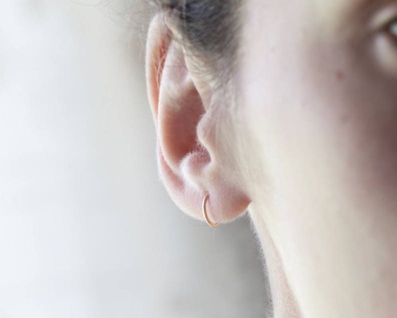 Helix hoop Rook earring Tragus earring Cartilage hoop earring Daith earring Conch earring. Helix earring