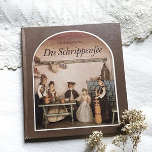 Vintage deutsches Kinderbuch. Vintage Buch auf Deutsch. Kinderbuch Schrippenfee von Gottfried Herold. Buch mit antiken Puppenfotos