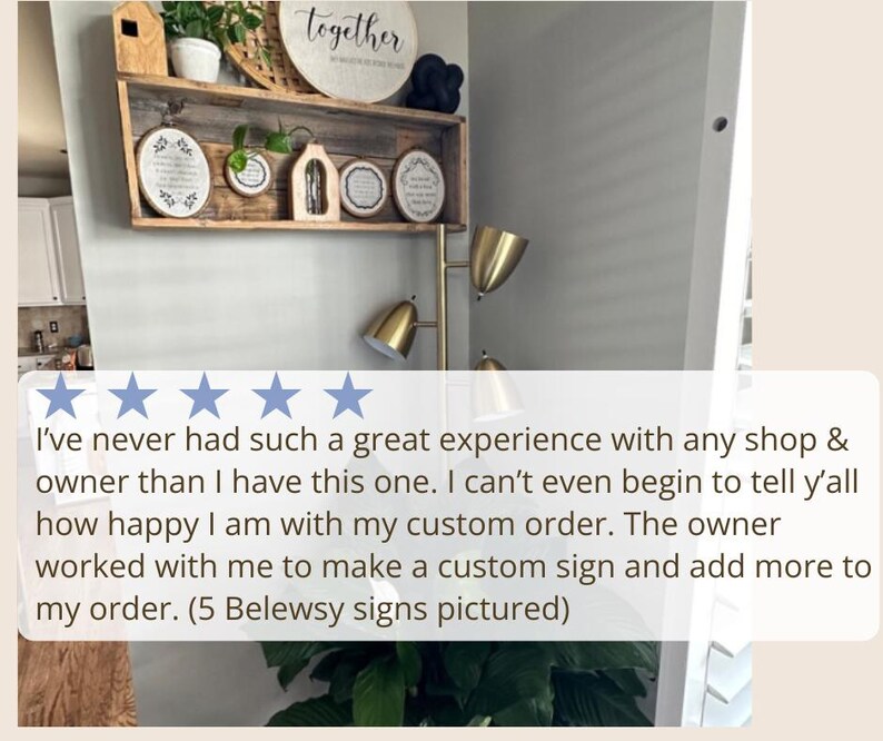 a room with a potted plant and a sign that says i've never