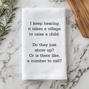 Witty Kitchen Towel New Parent Gift Humorous Home Decor Baby Shower Gift Village Raising Child Quote Funny Dish Towel Parenting Humor Gift