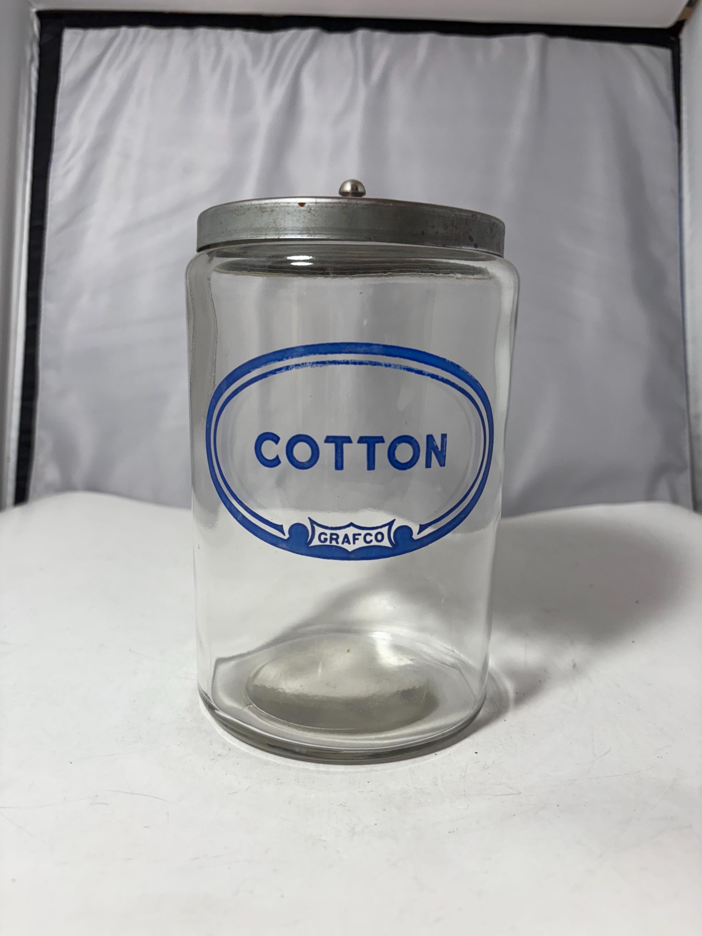 Grafco Glass Apothecary Jar with Steel Lid, vintage medical storage, blue cotton label, bathroom counter canister