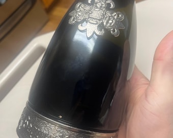 empty Segura Viudas champagne bottle with pewter base
