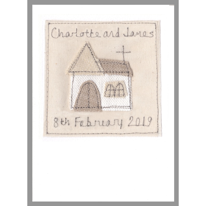 May include: A beige embroidered card with a small church design and the text "Charlotte and James 8th February 2019".