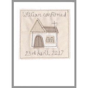 May include: A white fabric square with a stitched image of a church building and the text "William confirmed 23rd April 2017".