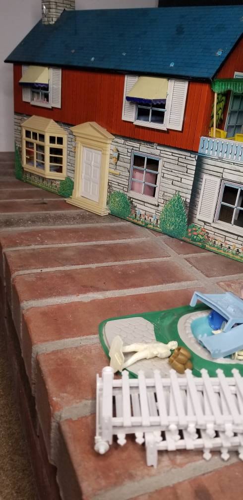 Vintage tin best sale dollhouse