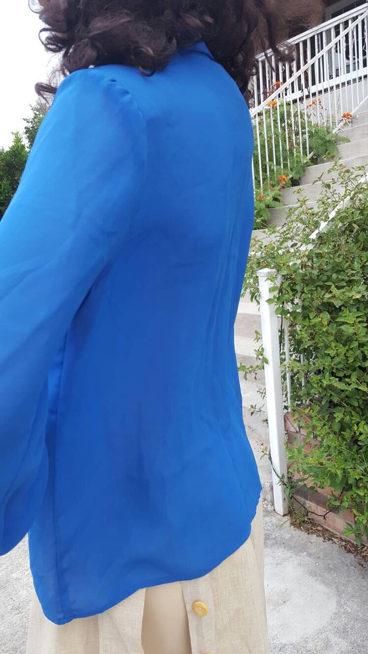 royal blue sheer blouse