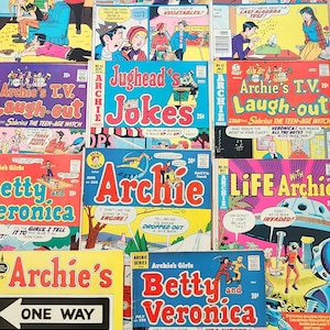 May include: A collection of vintage Archie comic books, featuring titles like "Jughead's Jokes," "Archie's T.V. Laugh-out," and "Betty and Veronica." The covers display colorful illustrations and text, with prices like 25¢ and 20¢.