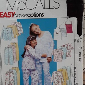May include: A sewing pattern for a girls' pajama set. The pattern includes a long-sleeved top, a short-sleeved top, and pants. The pattern is for sizes medium-large. The pattern is from McCall's Easy Endless Options.