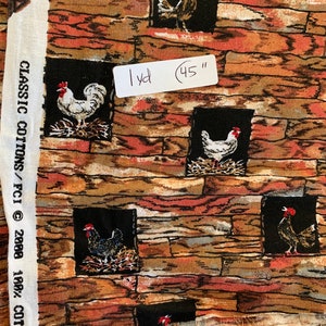 May include: A brown and red fabric with a repeating pattern of chickens in black frames. The fabric is labeled "Classic Cottons / FCI © 2008 100% Cotton" and "1 yd (45")".