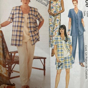 May include: A sewing pattern envelope labeled Womanstyle 2208 featuring illustrations of various outfits including a plaid button-down shirt, a solid-colored tank top, long trousers, a floral print sleeveless dress, and a pair of plaid shorts.