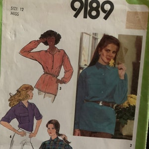 May include: Simplicity sewing pattern number 9189 for a women's blouse. The pattern includes four different styles of blouses, with long and short sleeves, and a variety of collars. The pattern is for size 12.