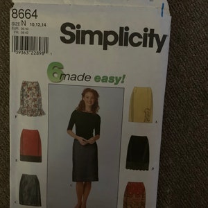 May include: A sewing pattern for six different skirts. The pattern is called "Simplicity" and is labeled "made easy!" The pattern includes a black skirt, a red skirt, a floral skirt, a yellow skirt, a black skirt with lace trim, and a patterned skirt. The pattern is for sizes 10, 12, and 14.