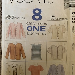 May include: A sewing pattern for a jacket, shirt, and top. The pattern is called "Great Looks One Easy Pattern" and is from McCall's. The pattern is for sizes Medium and Large.