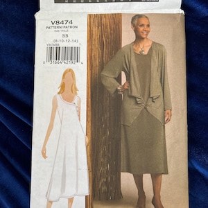 May include: Vogue Patterns V8474 sewing pattern. The pattern includes a dress and jacket ensemble. The package features a photo of a woman wearing the outfit. The pattern size range is 8-14.