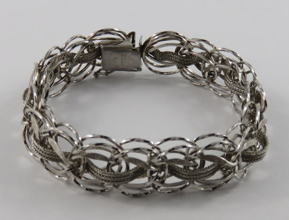 Vintage Sterling Silver 17 Charm Bracelet - Yourgreatfinds