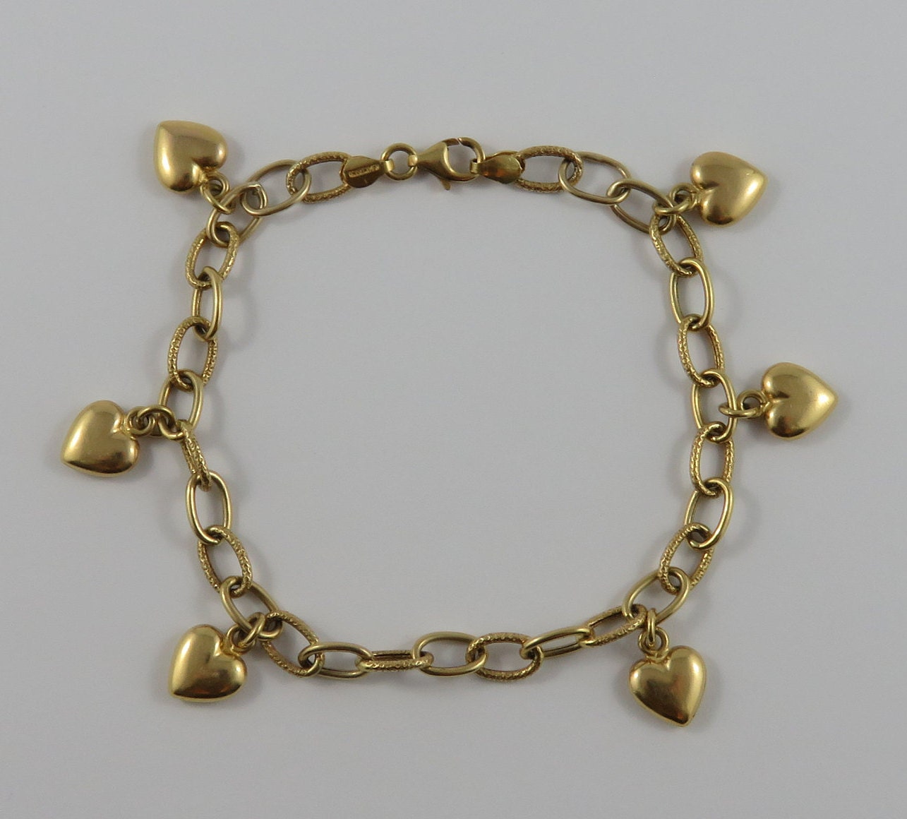 7 3 4 14K Gold Vintage Charm Bracelet With 6 Heart Charms Etsy