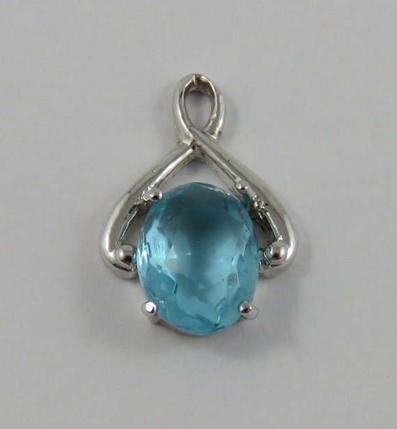 4 December birthstone charms 19 x 12mm silver tone